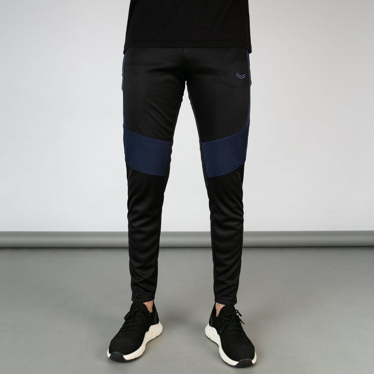 Black Quick Dry Versus Series Bottoms with Navy Mesh Panels